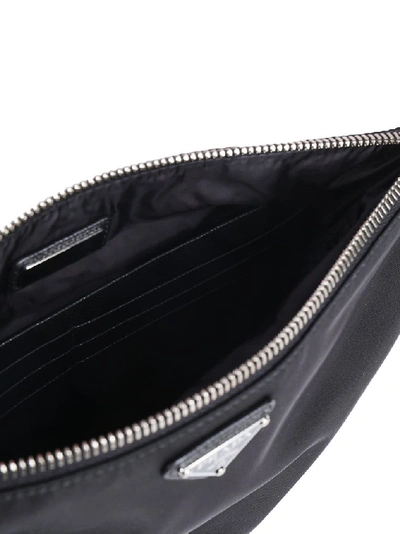 Shop Prada Logo Clutch Bag In Black