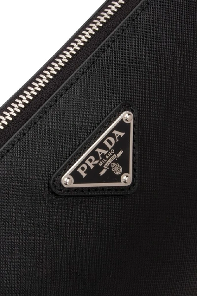 Shop Prada Logo Clutch Bag In Black