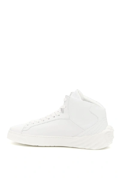 Shop Versace Leather Hi Top Sneakers In White