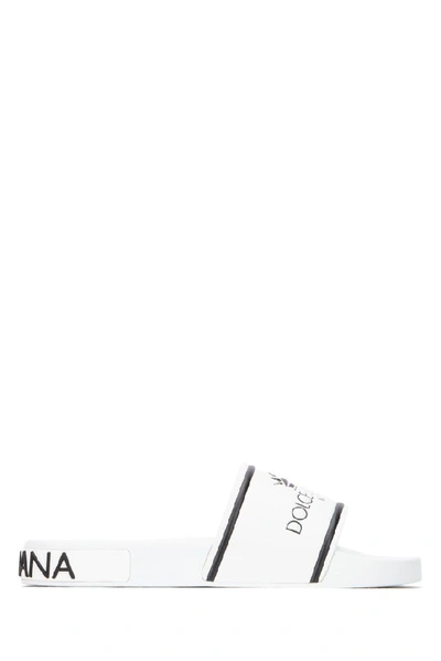 Shop Dolce & Gabbana Logo Embossed Sliders In White