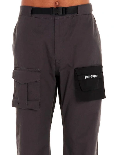 Shop Palm Angels Pocket Detailed Cargo Pants In Grey