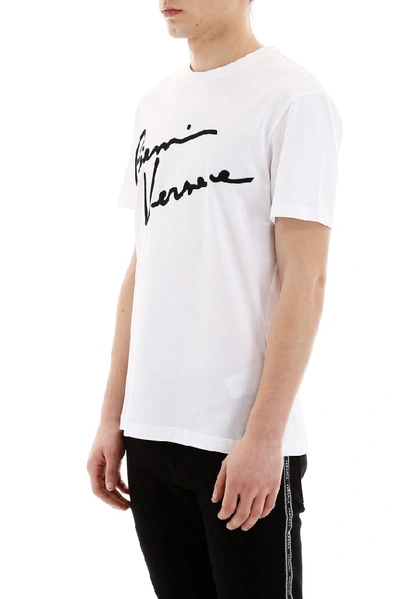 Shop Versace Signature Printed T-shirt In White