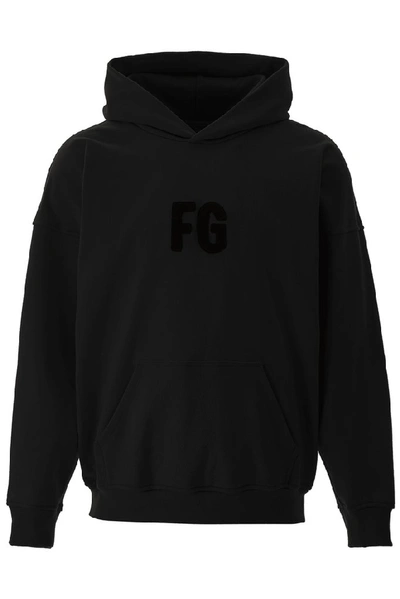 Shop Fear Of God Logo Hoodie In Black