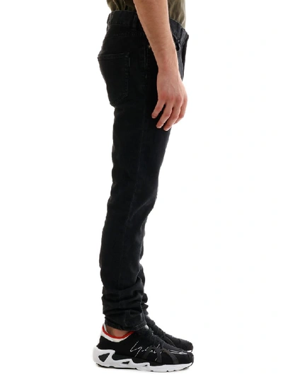 Shop Saint Laurent Skinny Jeans In Black