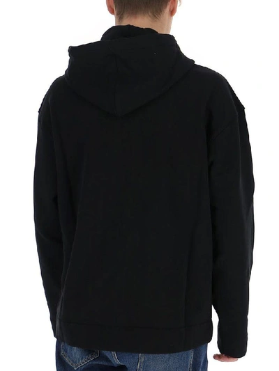 Shop Moschino Zipped Logo Print Hoodie In Black