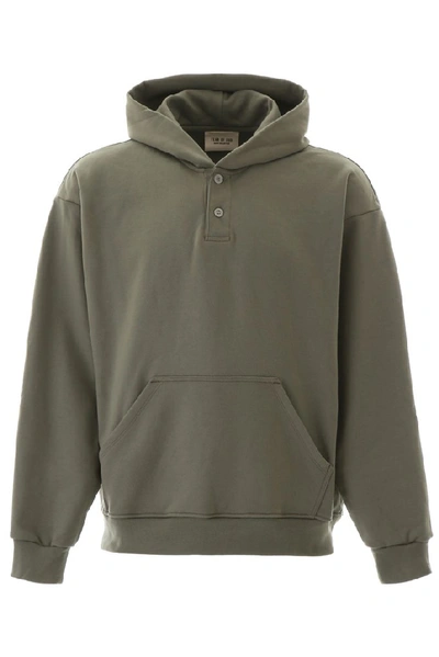 Shop Fear Of God Henley Oversized Hoodie In Green