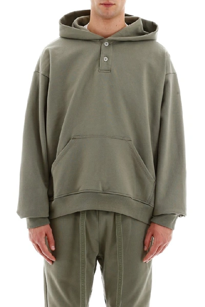 Shop Fear Of God Henley Oversized Hoodie In Green