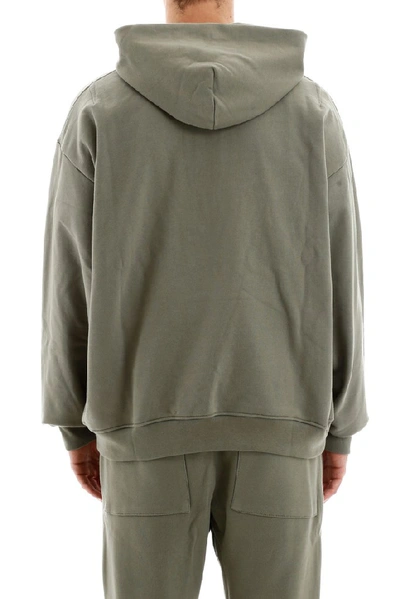 Shop Fear Of God Henley Oversized Hoodie In Green