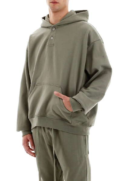 Shop Fear Of God Henley Oversized Hoodie In Green