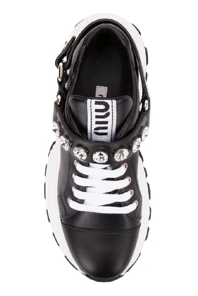 Shop Miu Miu Buckle Embellished Sneakers In Black