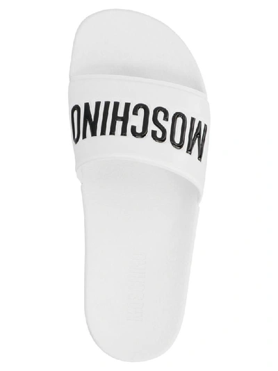 Shop Moschino Logo Slides In White