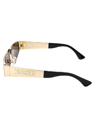 Shop Moschino Eyewear Geometric Frame Sunglasses In Gold