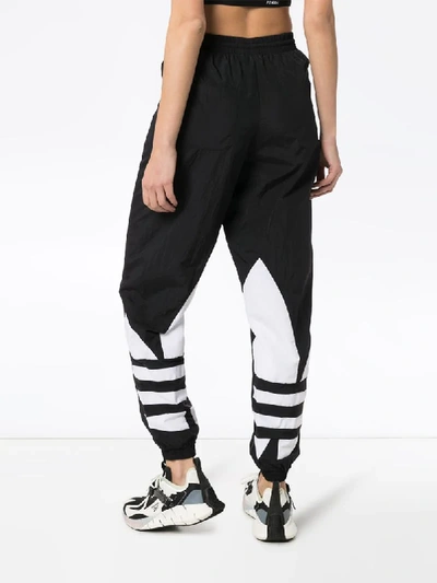 Shop Adidas Originals Logo Print Track Pants In Black