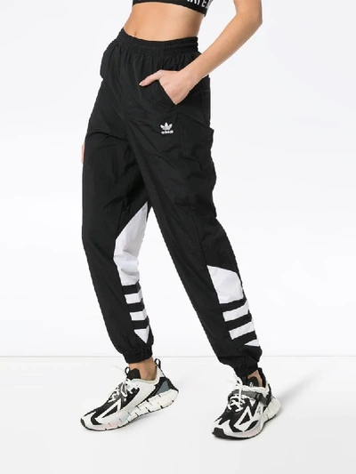 Shop Adidas Originals Logo Print Track Pants In Black