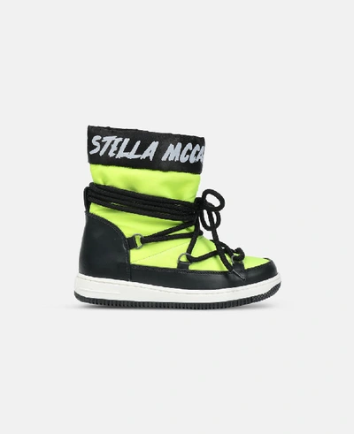 Shop Stella Mccartney Kids Yellow Ski Boots With Logo