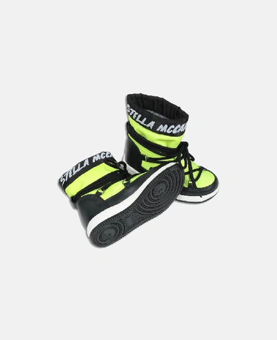 Shop Stella Mccartney Kids Yellow Ski Boots With Logo