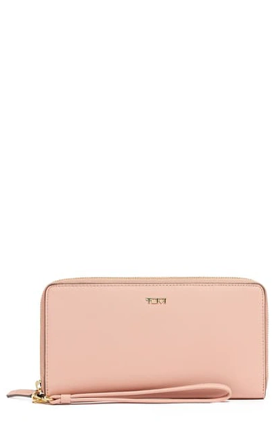 Shop Tumi Belden Leather Travel Wallet In Blush