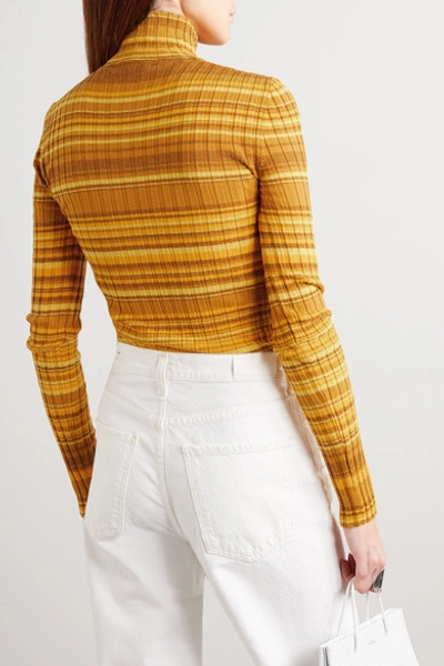 Shop Jw Anderson Striped Ribbed Wool-blend Turtleneck Sweater In Mustard