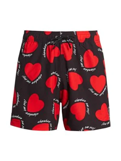 Shop Amiri Heart-printed Swim Trunks In Black