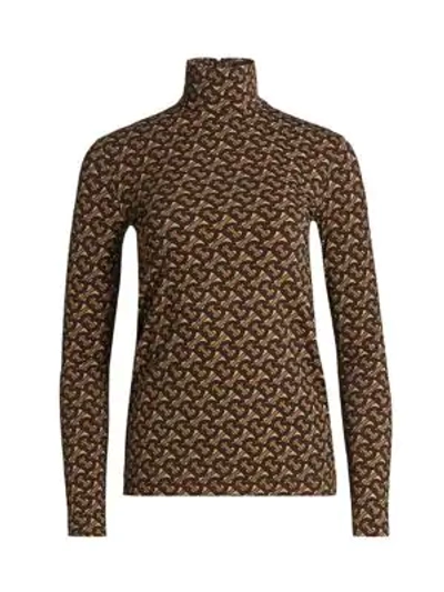 Shop Burberry Trancura Monogram Turtleneck Top In Bridle Brown