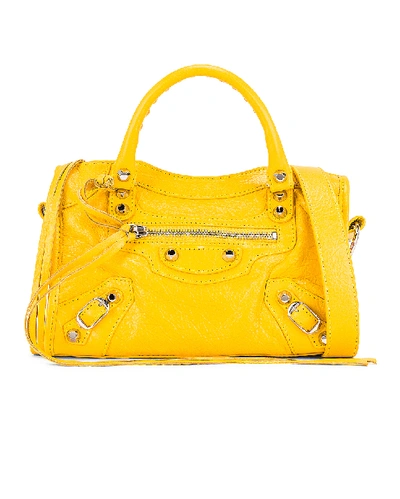 Shop Balenciaga Mini Classic City Bag In Yellow