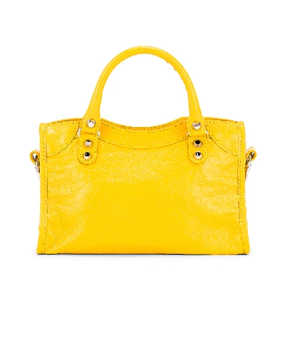 Shop Balenciaga Mini Classic City Bag In Yellow