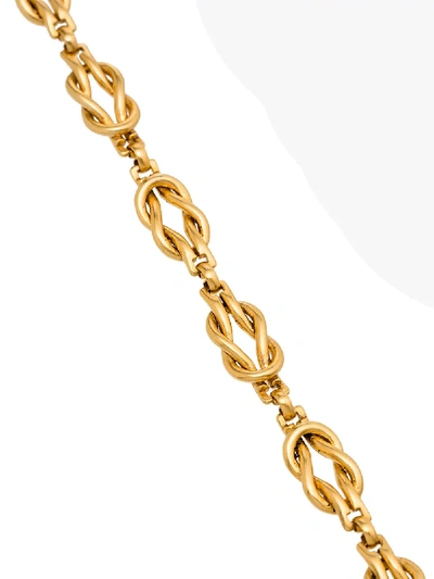 Shop Brinker & Eliza Love Knot Necklace In Gold