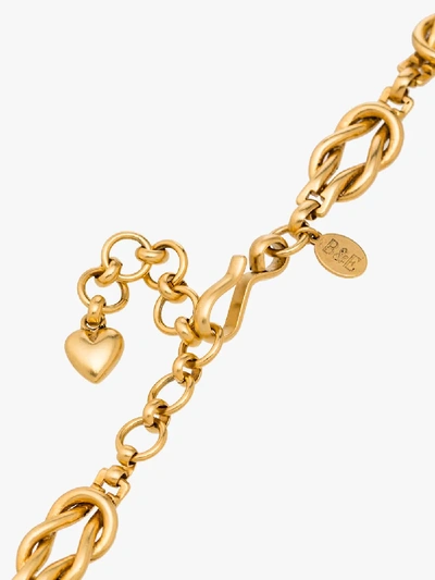 Shop Brinker & Eliza Love Knot Necklace In Gold