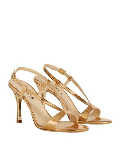 Shop Furla Sandals In Gold