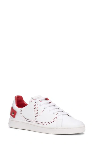Shop Valentino Backnet Perforated Sneaker In White/ Red