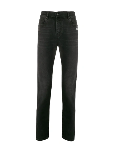 Shop Off-white Tapered Skinny Jeans In Black