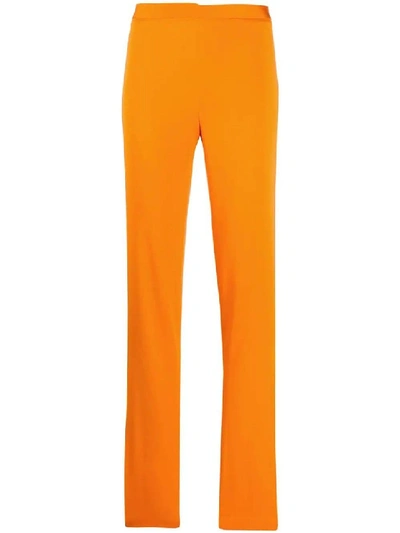 Shop Versace High-waisted Boot Cut Pants In Orange