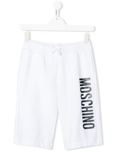 Shop Moschino Teen Logo Printed Track Shorts In White