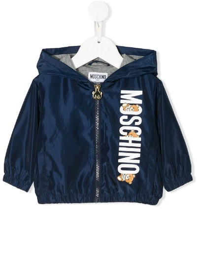 Shop Moschino Logo Print Rain Jacket In Blue
