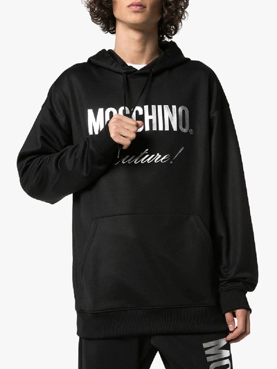 Shop Moschino Metallic Logo Print Hoodie In Black