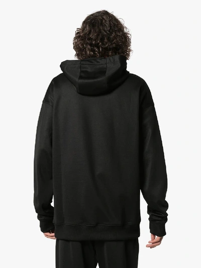 Shop Moschino Metallic Logo Print Hoodie In Black
