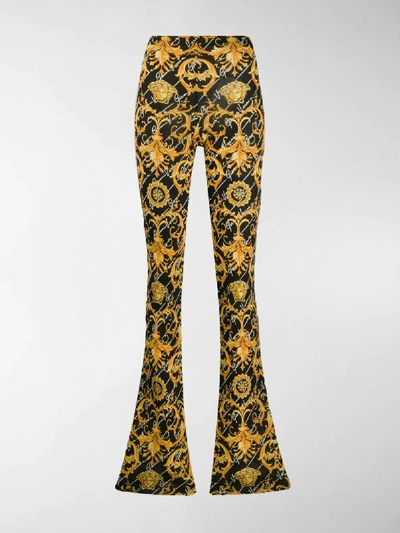 Shop Versace Barocco Signature Print Flared Trousers In Yellow