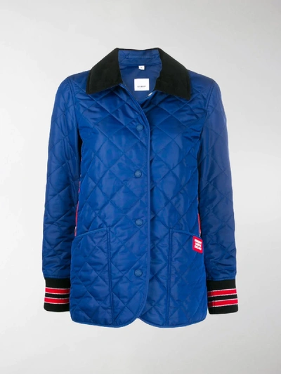 Shop Burberry Quilted Logo Patch Buttoned Jacket In Blue