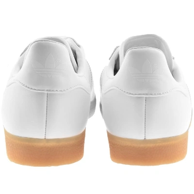 Adidas originals gazelle trainers in hotsell white leather with gum sole