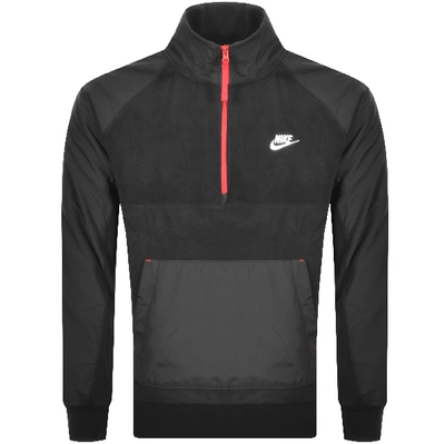 Shop Nike Half Zip Winter Fleece Sweatshirt Black