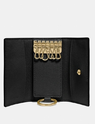 Shop Coach Six Ring Key Case - Women's In Black/light Gold