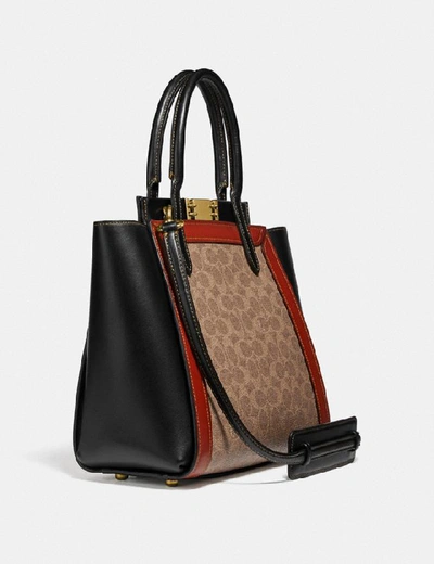 Shop Coach Troupe Tote In Signature Canvas In Tan/rust/brass