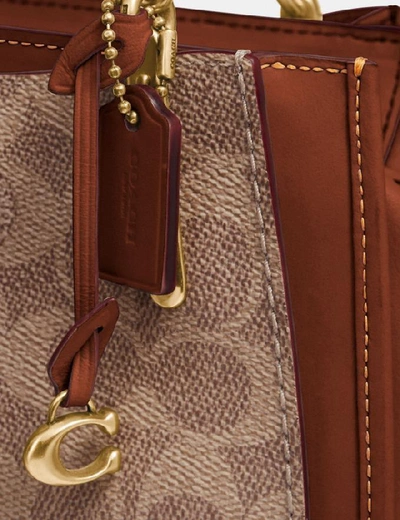 Shop Coach Dreamer 21 In Signature Canvas In Tan/rust/brass