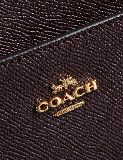 Shop Coach Messenger Crossbody In Oxblood/gold