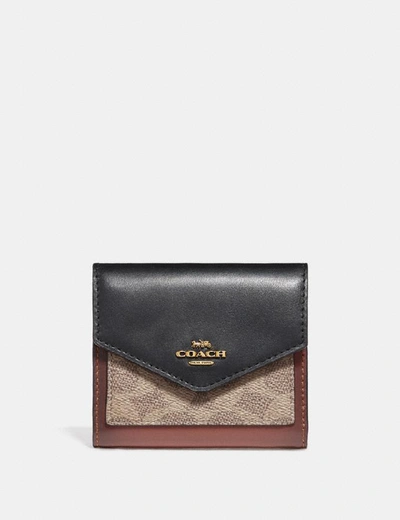Shop Coach Small Wallet In Colorblock Signature Canvas - Women's In Tan/black/brass