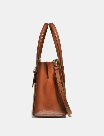Shop Coach Charlie Carryall 28 In Signature Canvas In Brass/rust