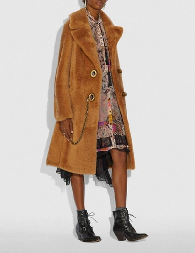 Shop Coach Long Shearling Coat In Caramel