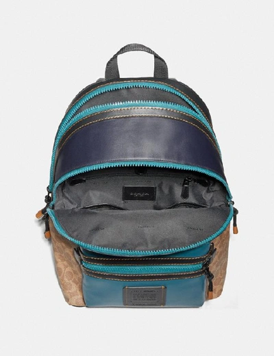 Shop Coach Academy Backpack In Signature Canvas With Rexy By Zhu Jingyi - Men's In Khaki/black Copper
