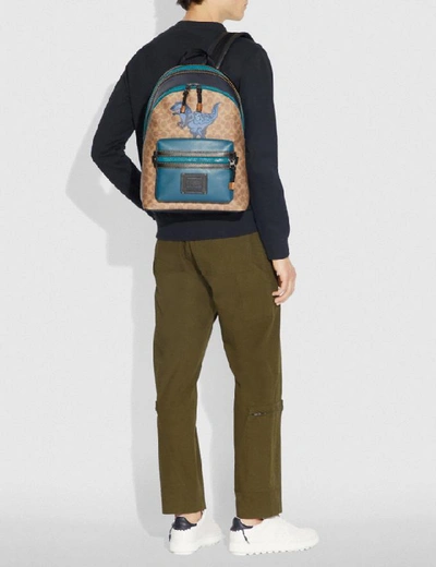 Shop Coach Academy Backpack In Signature Canvas With Rexy By Zhu Jingyi - Men's In Khaki/black Copper
