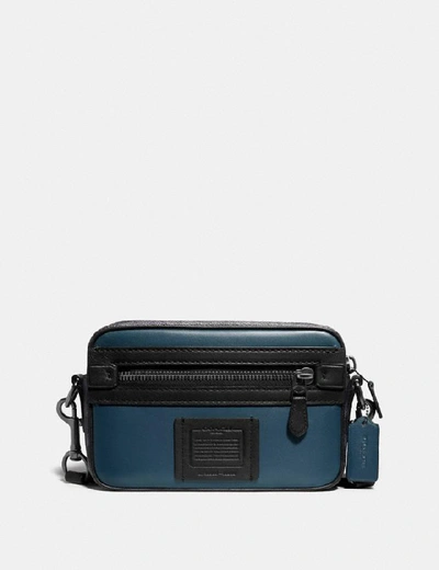 Shop Coach Academy Crossbody With Signature Canvas Blocking In Color<lsn_delimiter>black Copper/midnight Navy/charcoal